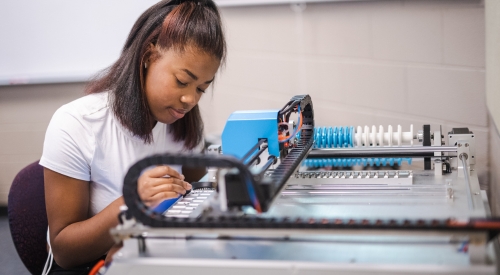 Student works on an engineering project at the K-State Salina campus.