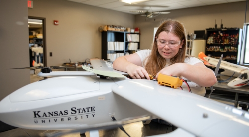 A K-State Salina UAS student learns how to build a drone during lab time. 
