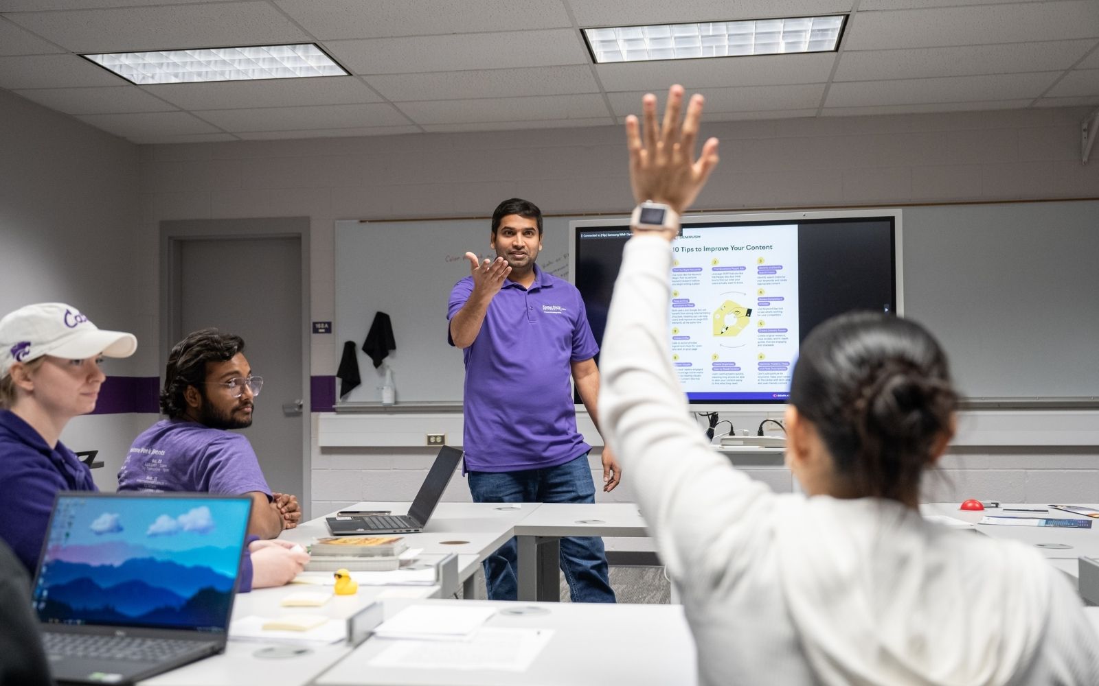 A K-State Salina instructor calls on a student who raises her hand during class. 