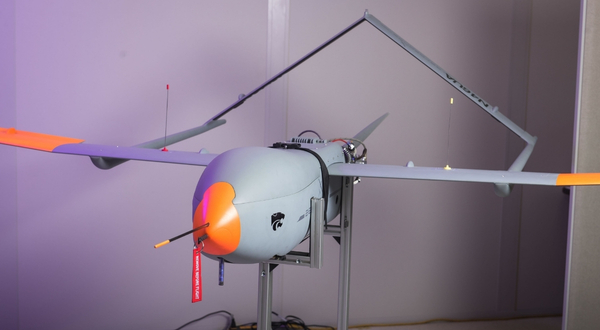 AAI Aerosonde Mk4.7 drone with purple lighting backdrop at the K-State Salina campus