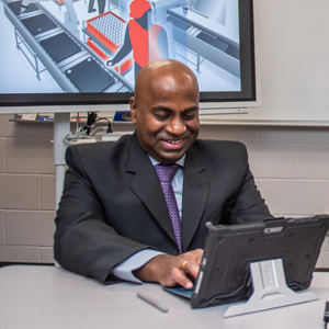 Man on computer in Applied Data Science and Machine Learning