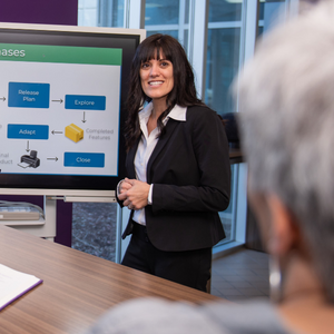 Woman giving presentation in Applied Data Science and Machine Learning